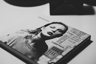 A vibrant cover of a magazine featuring bold typography and colorful illustrations.