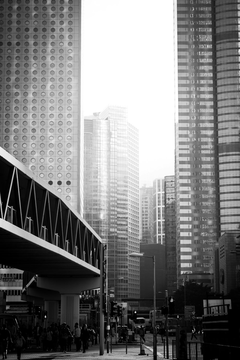 grayscale photography of high rise buildings