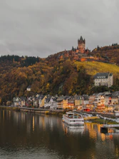 white motorboat near the dock during daytime