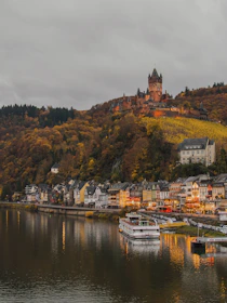 white motorboat near the dock during daytime