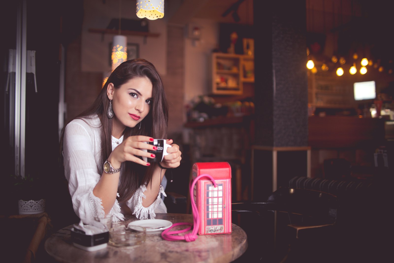 Sigma 30mm F1.4 EX DC HSM sample photo. Woman holding mug inside photography