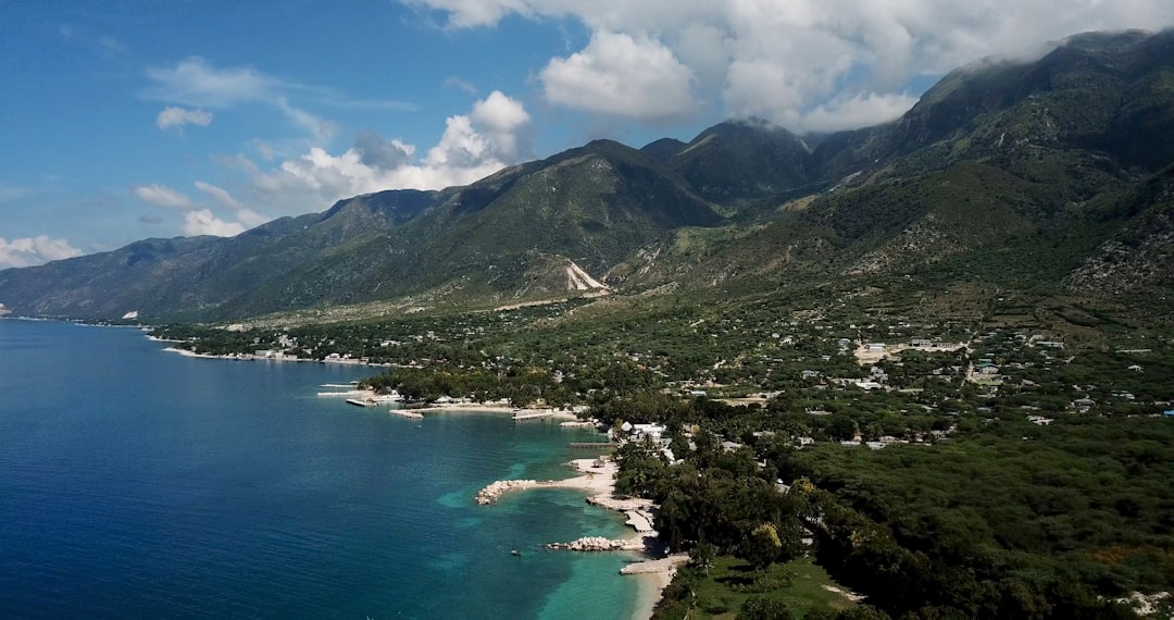 town at the foot of mountain by the sea