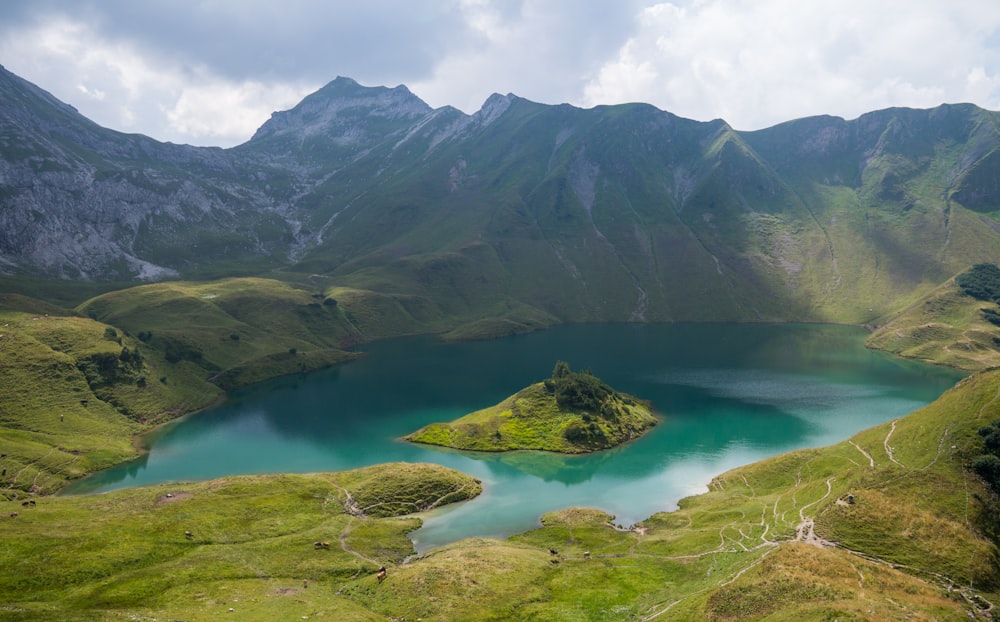 body of water surrounded by mountains