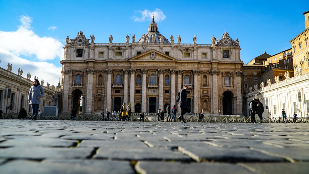 people in front of cathedral during daytime