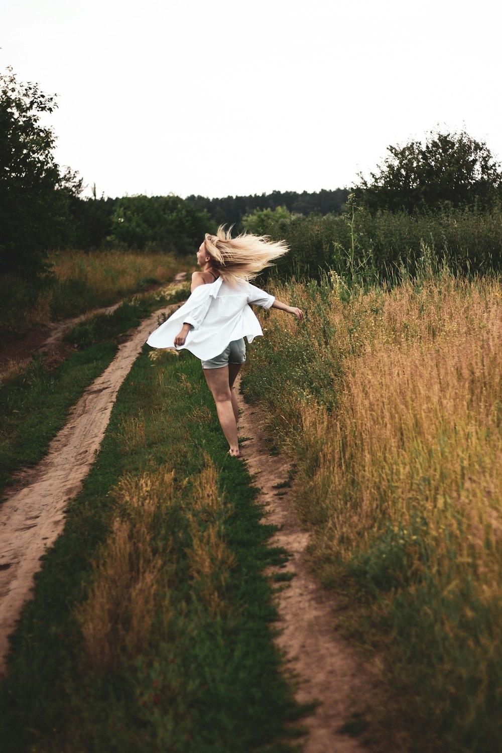 woman walking on pathway