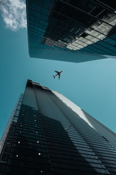 low-angle photography of buildings under clear blue sky during daytime
