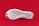 A close-up view of the sole of a white shoe with distinct geometric patterns. The sole has red and black patches on its heel area and a small logo in the middle. The background is solid red, making the sole stand out prominently.