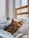 cat sleeping on bed