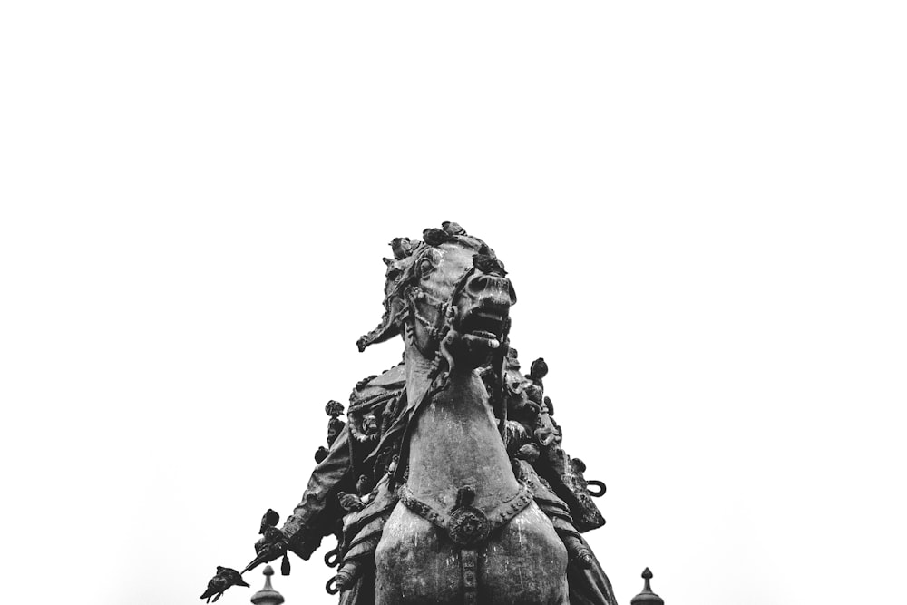 grayscale photo of horse statue