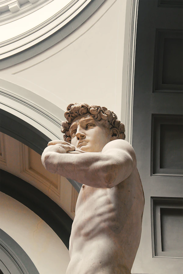 White marble sculpture on pedestal