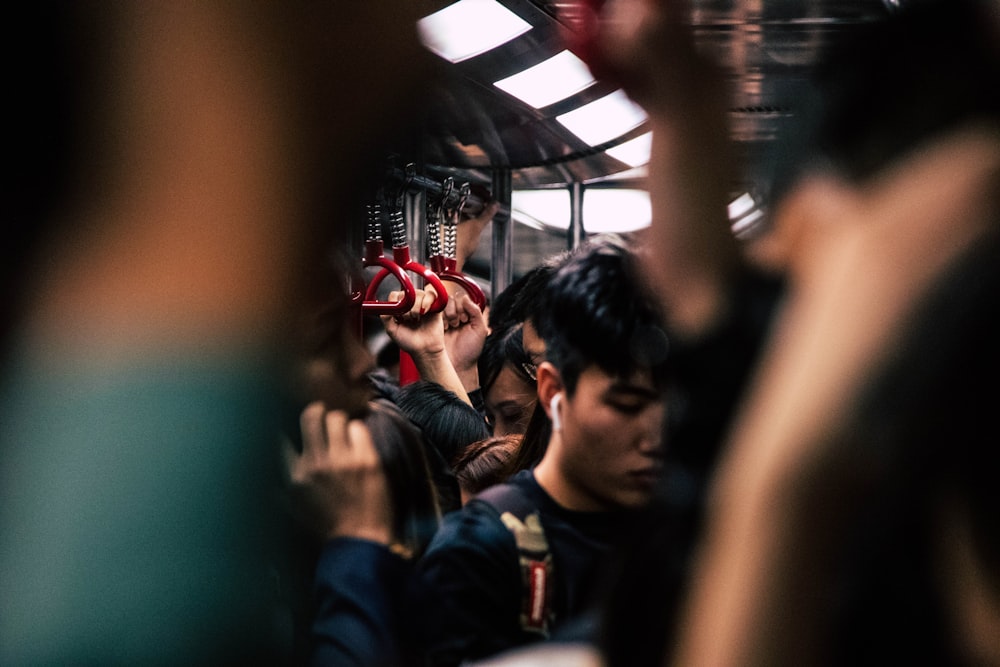 people standing inside train