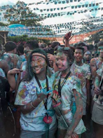 Colorful decorations and happy faces at a festive gathering.