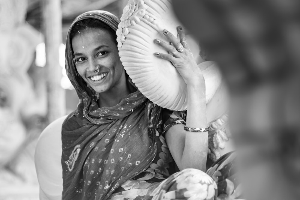 grayscale photo of smiling woman