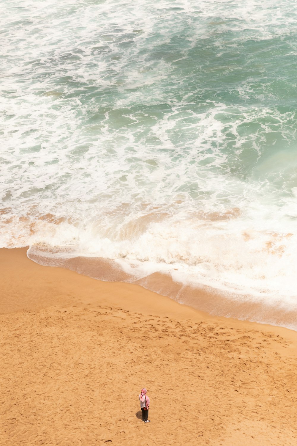 person standing on shore