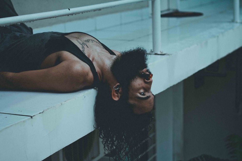 close-up photography of man lying on floor