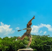 Athlete crossing the finish line with a look of determination and triumph.