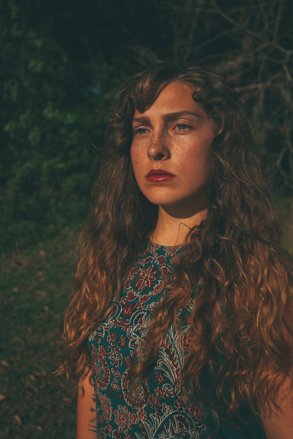 woman standing near tree during daytime