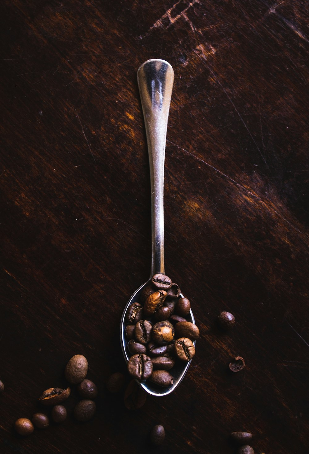 spoon of coffee beans