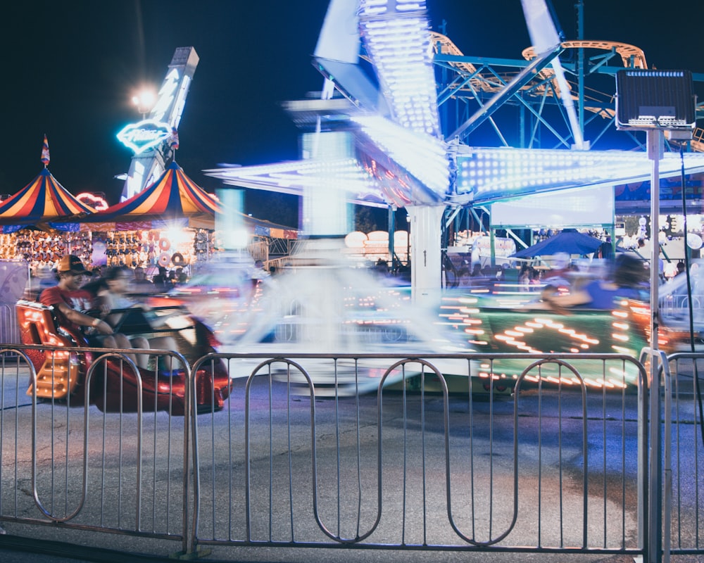 people riding on amusement rides