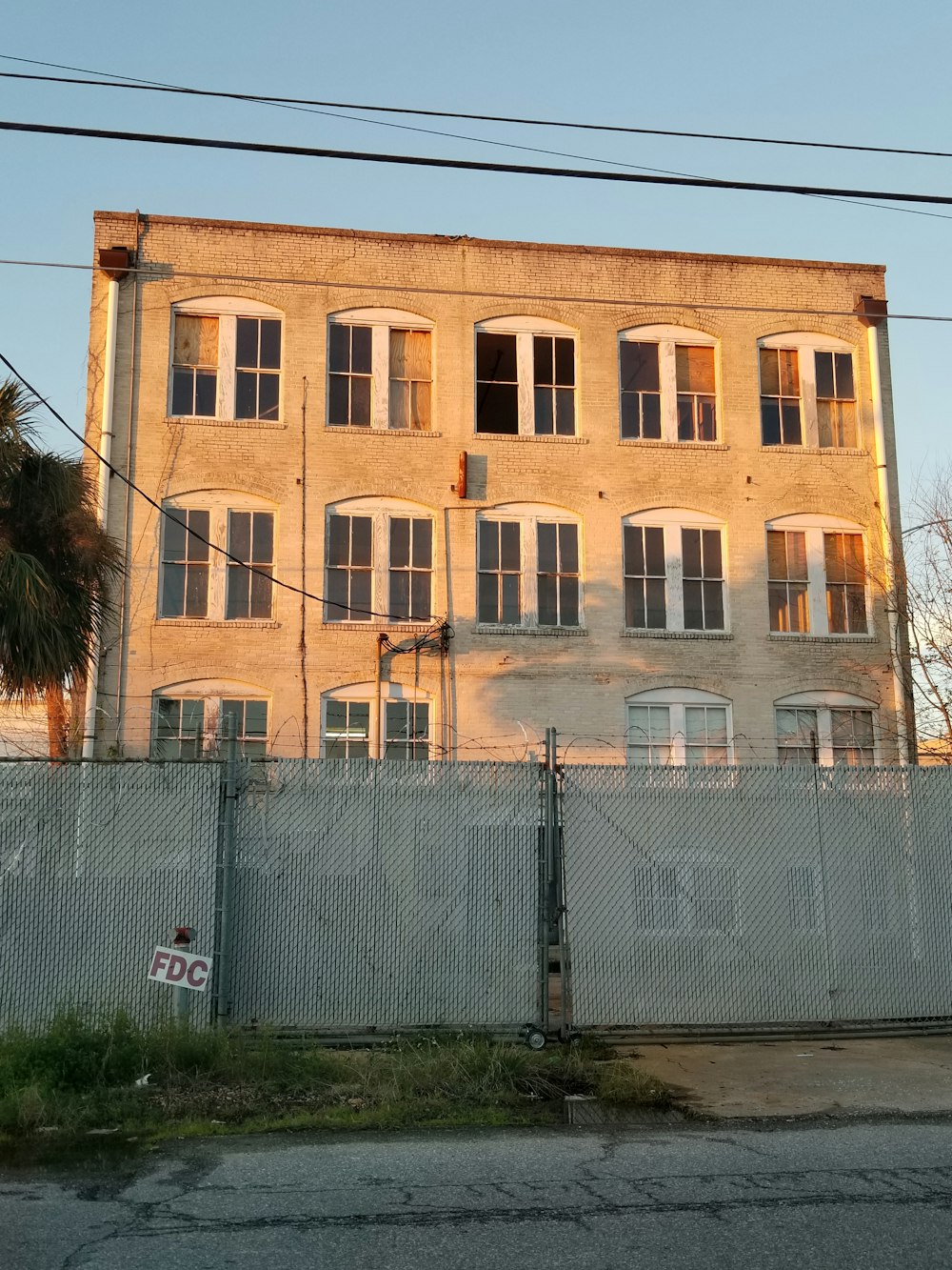 brown structure behind gate