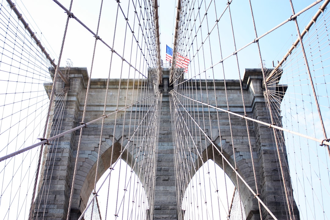 American flag atop bridge tower