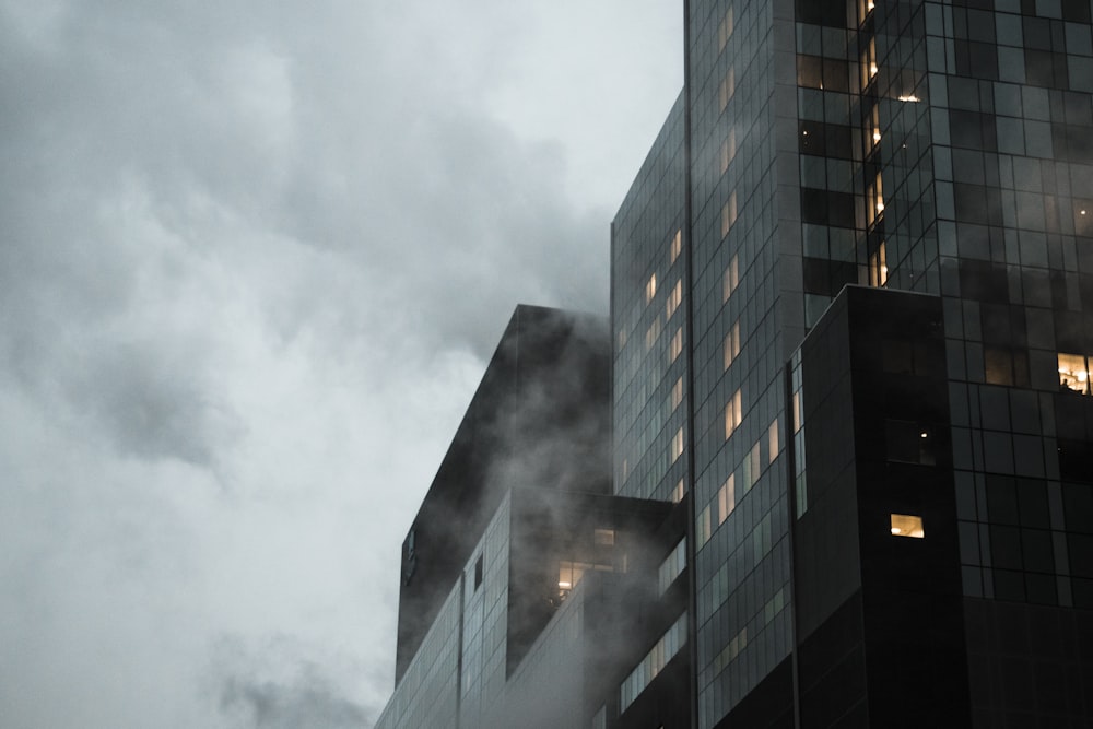 building with white fog beside it