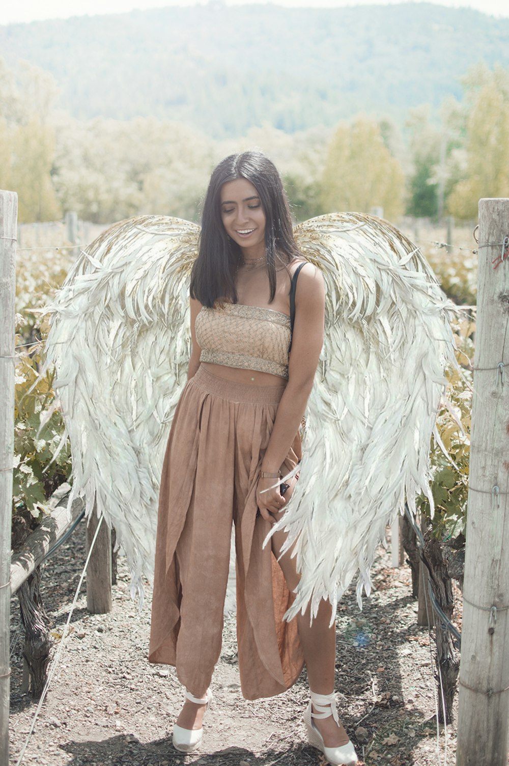 woman wearing qngel wings