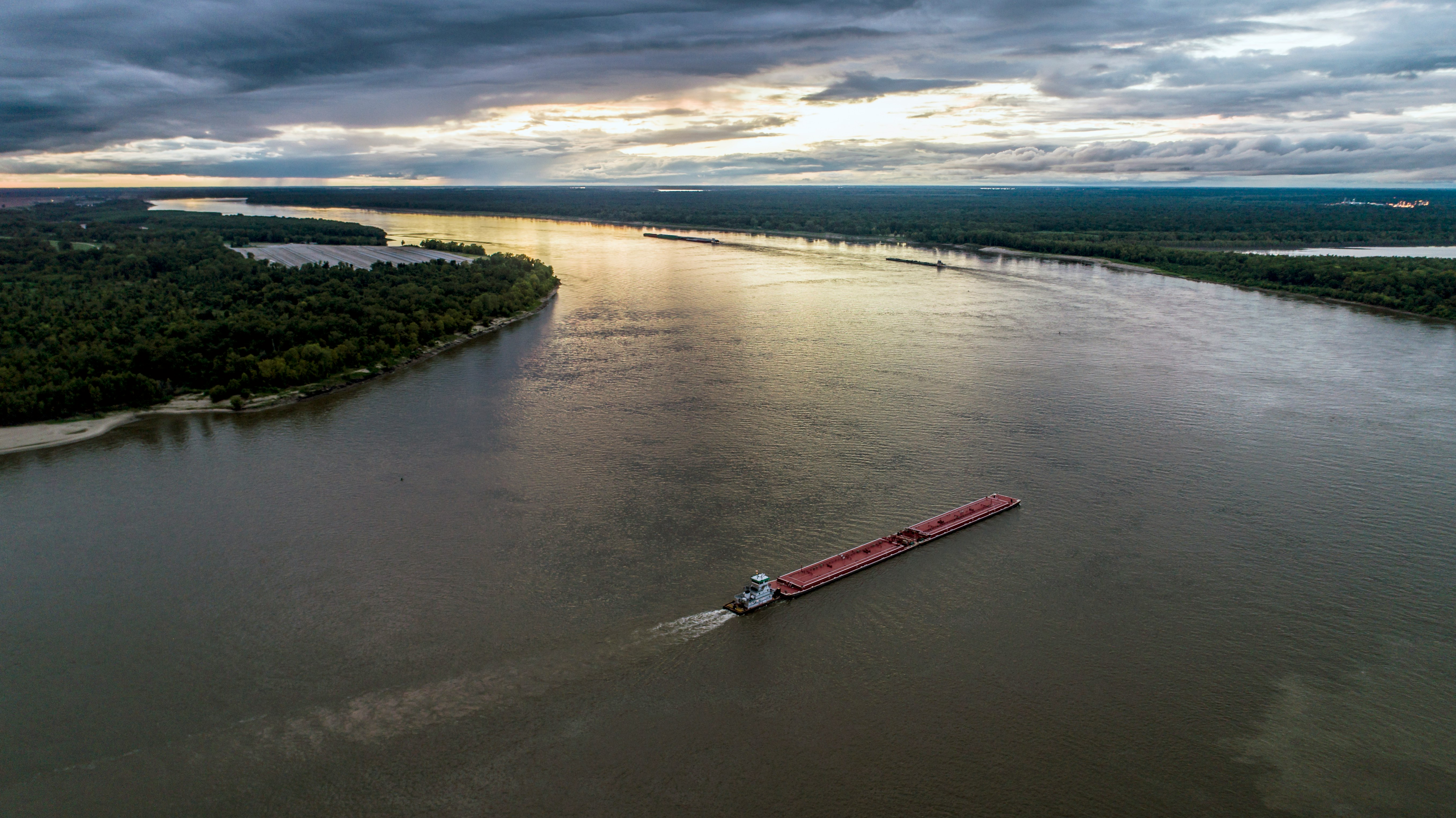 red boat on body of water