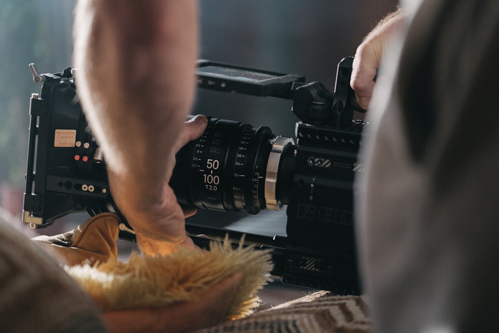 shallow focus photo of black video camera