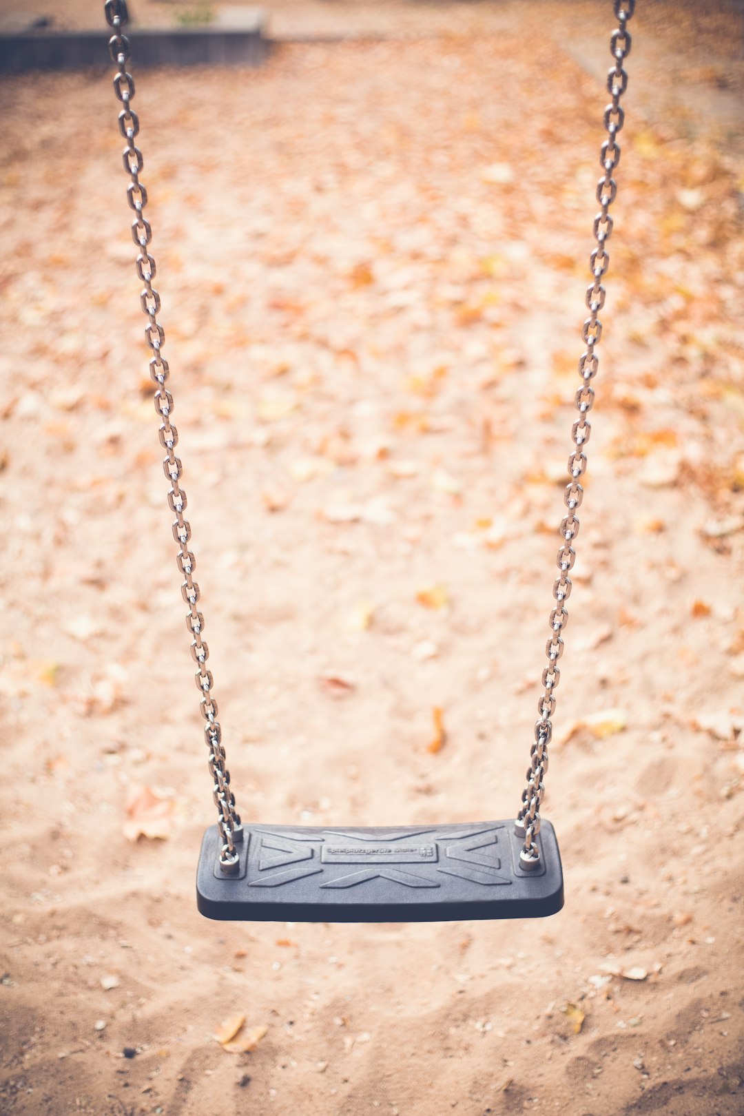 vacant gray outdoor swing