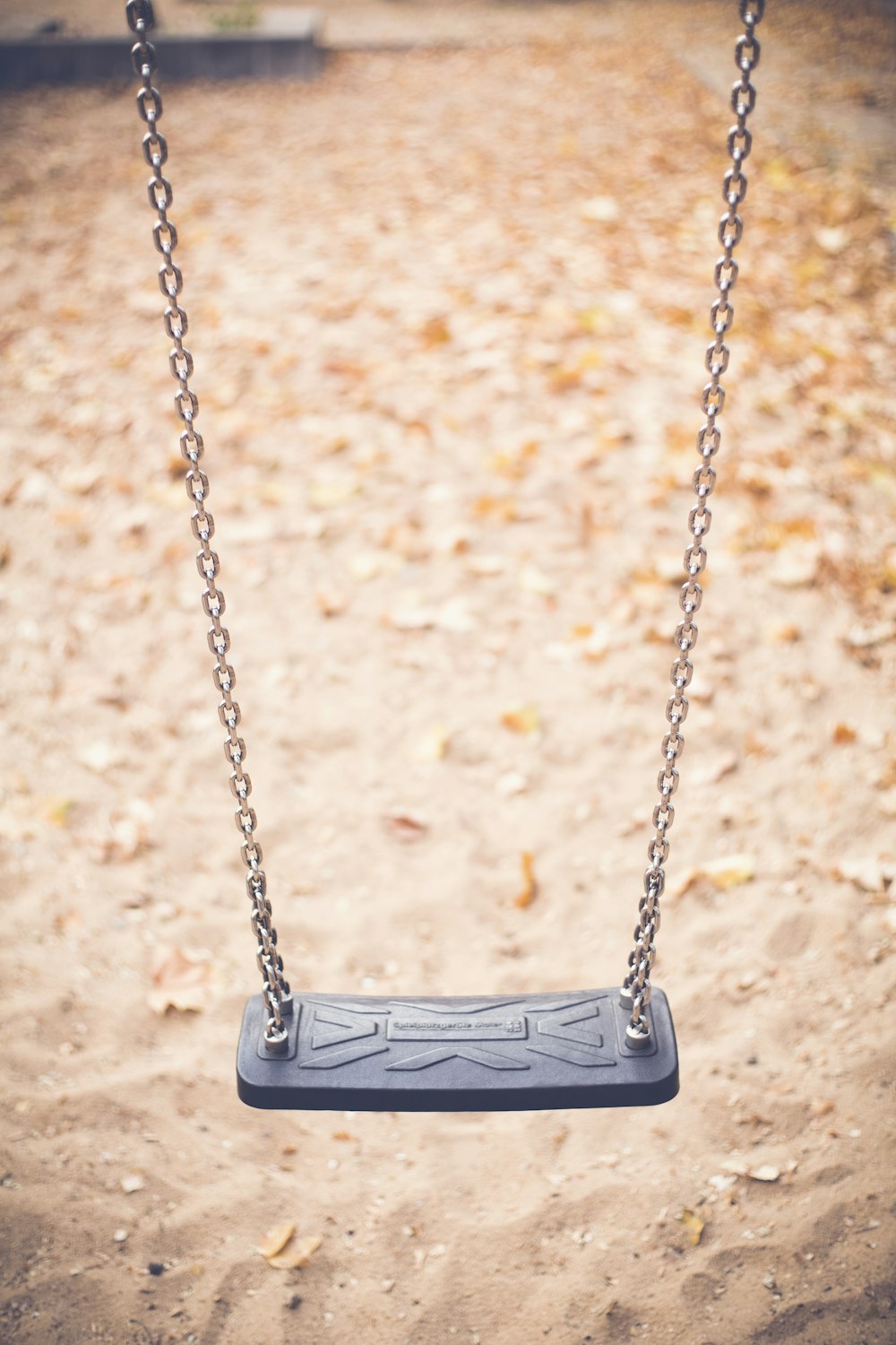 vacant gray outdoor swing