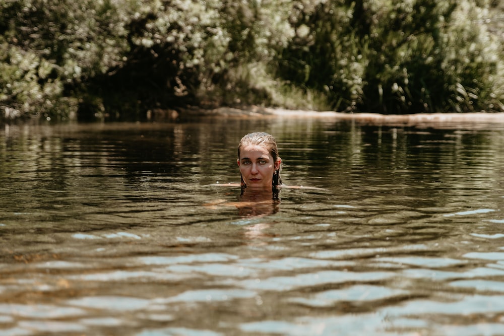 woman swimming at river