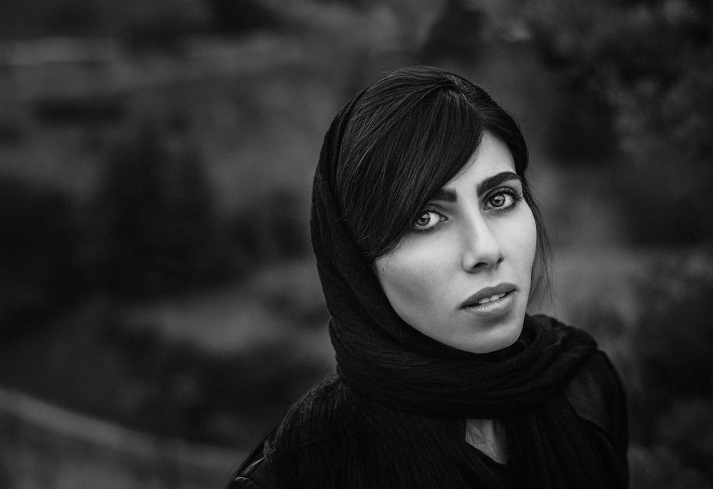 black and white photo of woman with hijab