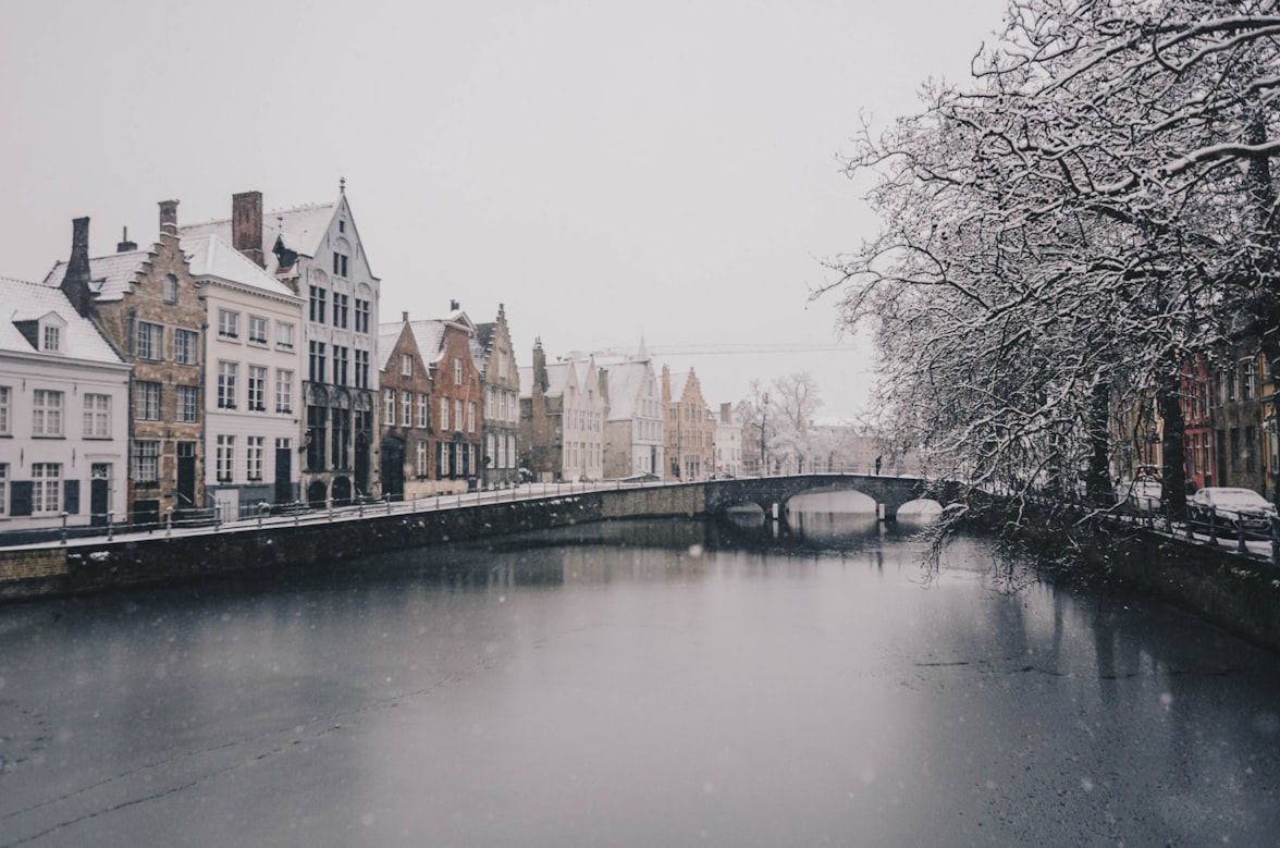 Snowy canal in Brugge, Belgium