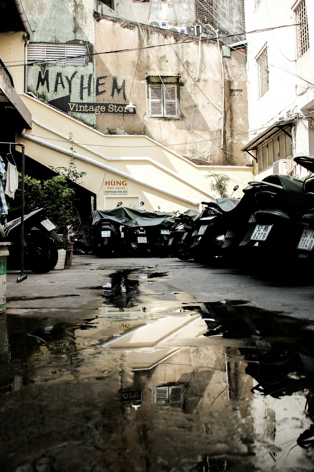 parked black motor scooters