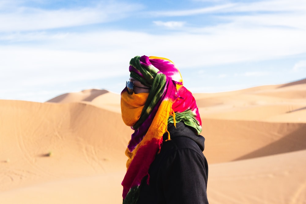 person standing on desert during daytime