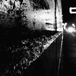 Close-up of a freshly coated wall treated with Aqua-Shield, highlighting its glossy finish.