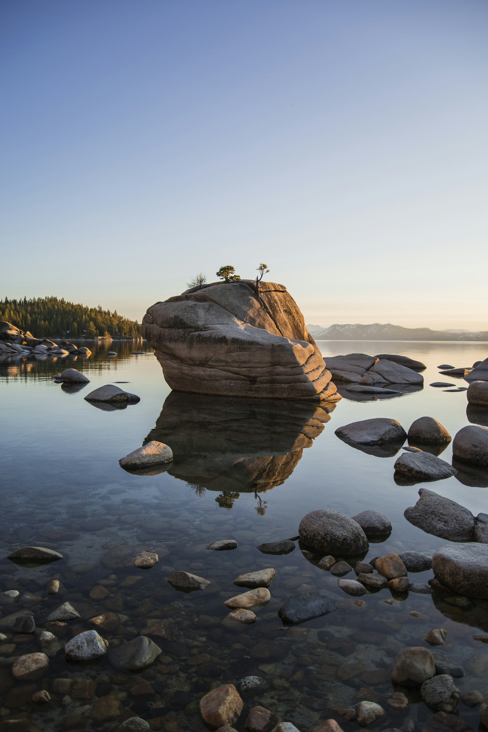 Nikon D610 + AF Zoom-Nikkor 28-80mm f/3.3-5.6G sample photo. Rock on lake under photography