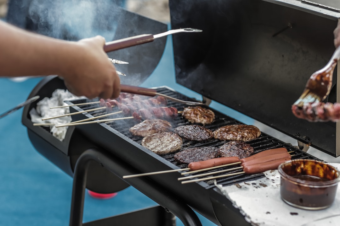 person grilling foods .