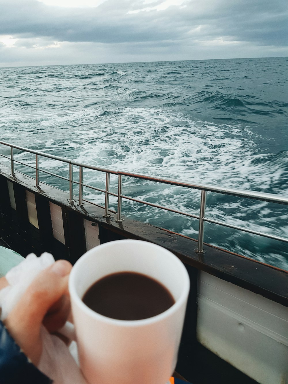 black liquid filled mug