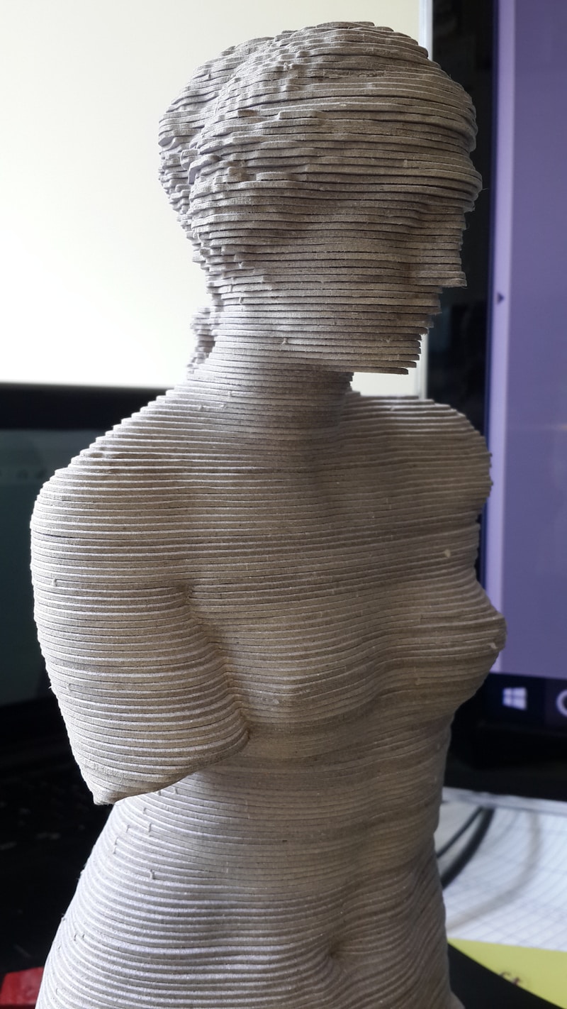 Multiple 3D printed objects showing different quality levels