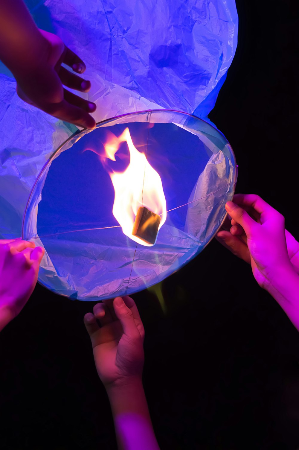 person holding white lantern