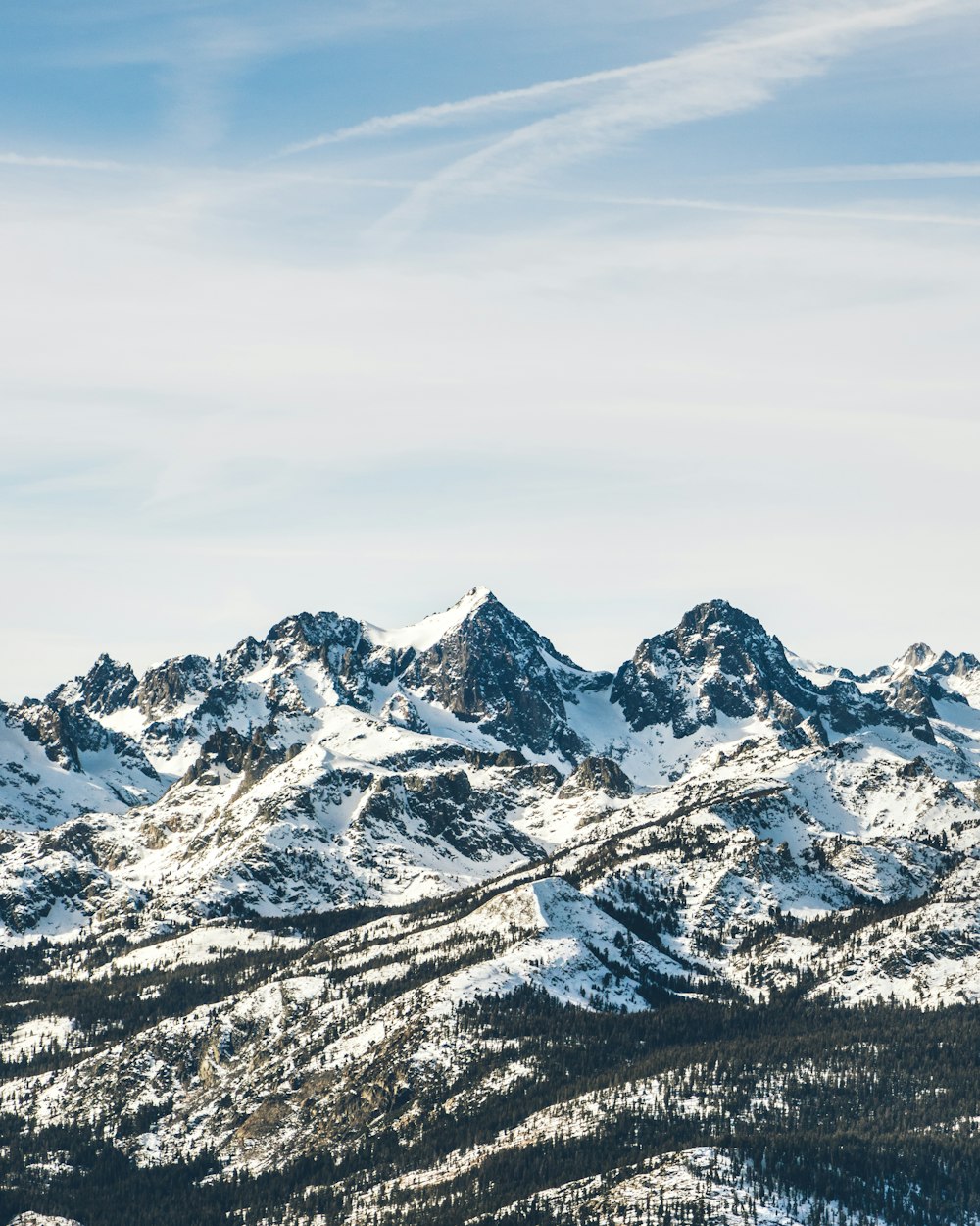 mountain under white and blue sky