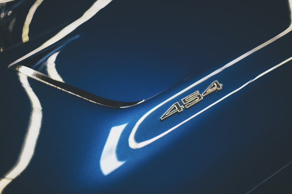 a close up of the emblem on a sports car