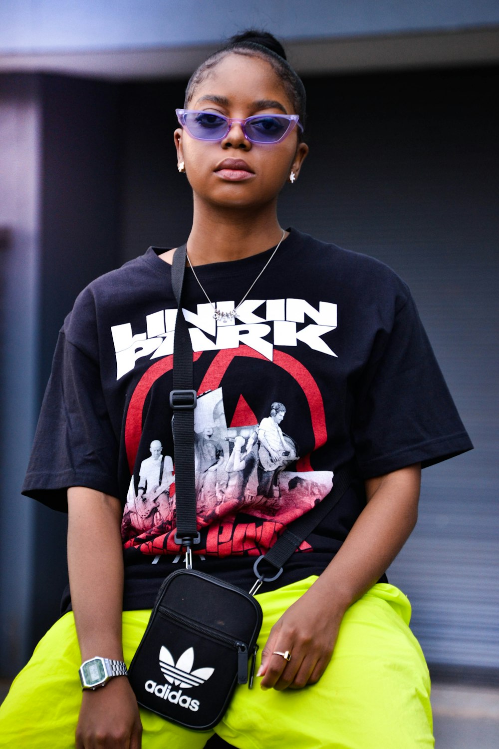 selective focus photography of woman wearing Linkin Park crew-neck t-shirt