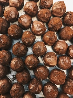 Delicious chocolate truffles arranged on a decorative platter.