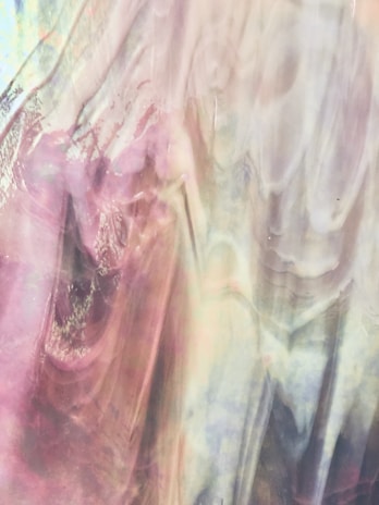 An abstract digital media artwork blending music notes and visual patterns in soft hues.