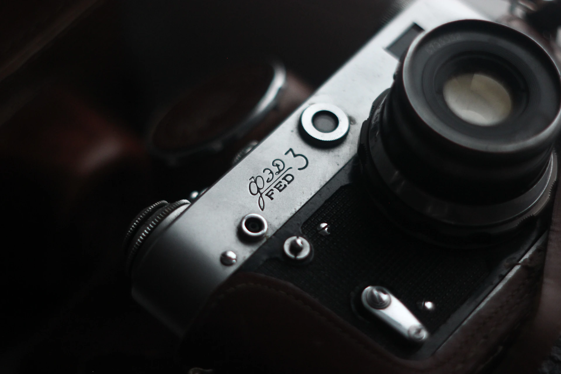 Close-up of a product's intricate details, showing the texture and craftsmanship under soft lighting.