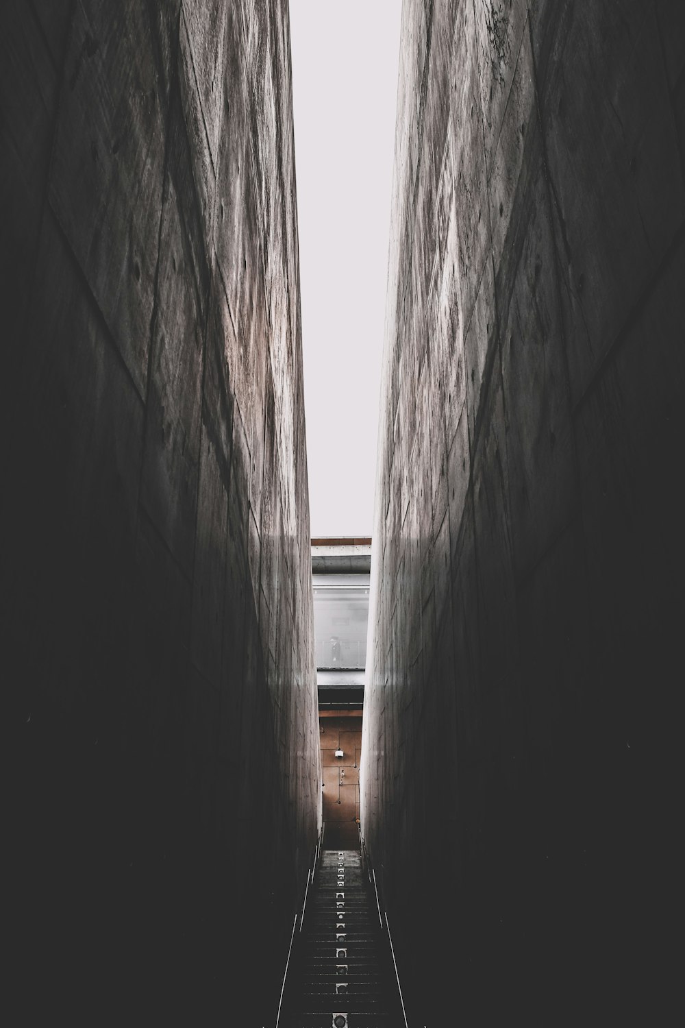 hallway under white sky