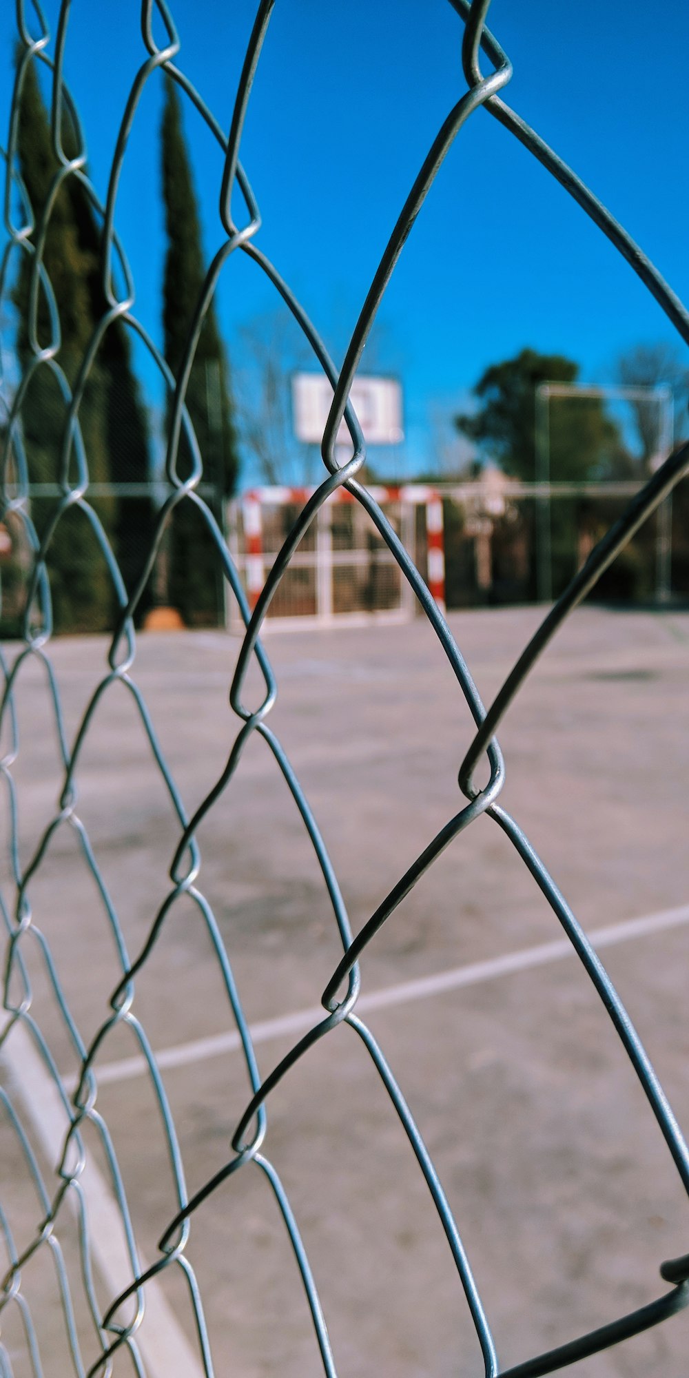 shallow focus photo of cyclone fence